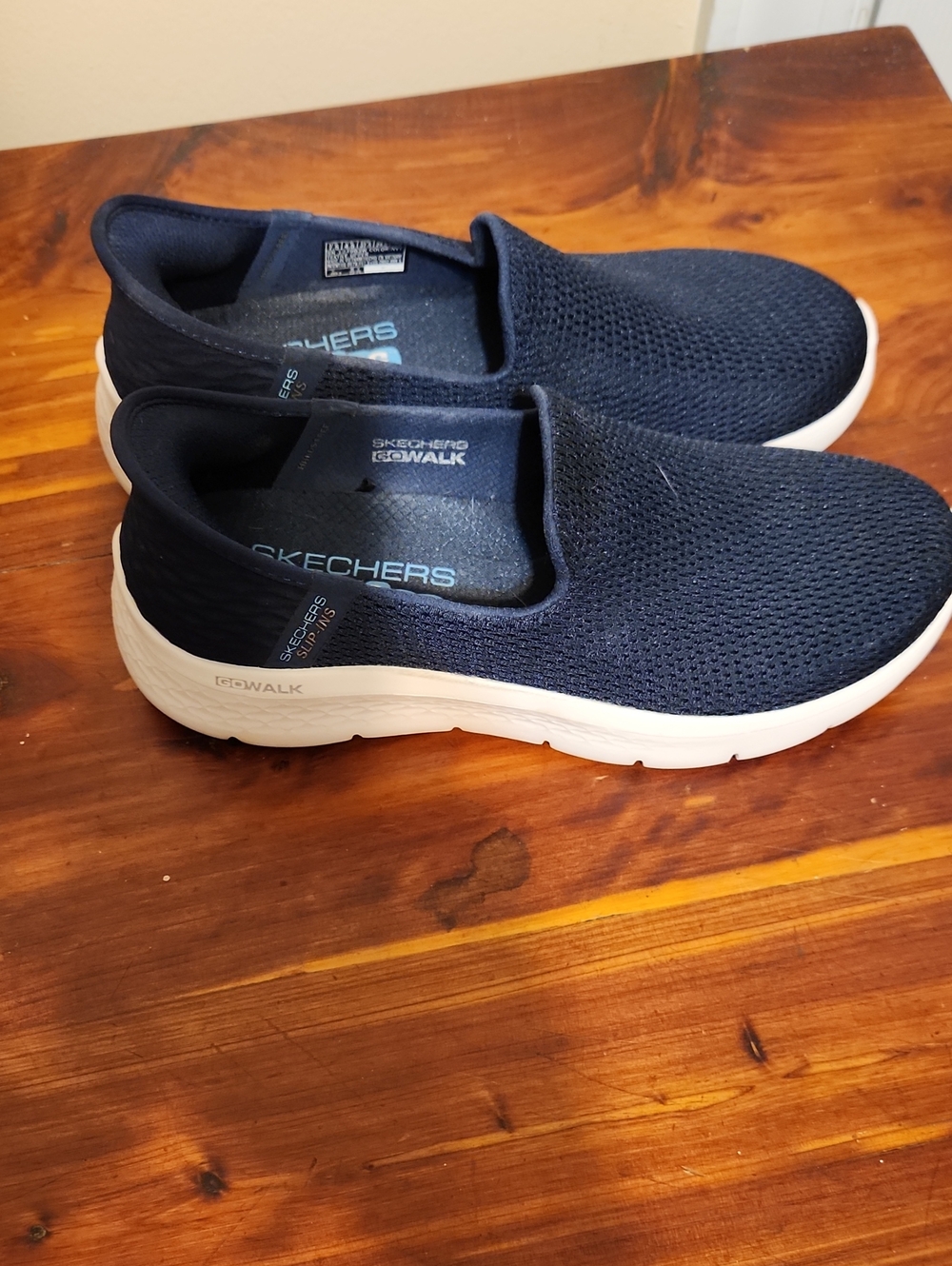 Skechers Womens  Navy and White Slip-On GOWalk Sneakers